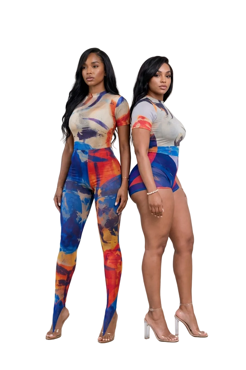 Two models standing back-to-back wearing The MYCA Canvas Body Series abstract print outfits; one in a full-length bodycon leggings jumpsuit and the other in a mesh bodysuit and mini shorts set with clear heels on a transparent grid background.